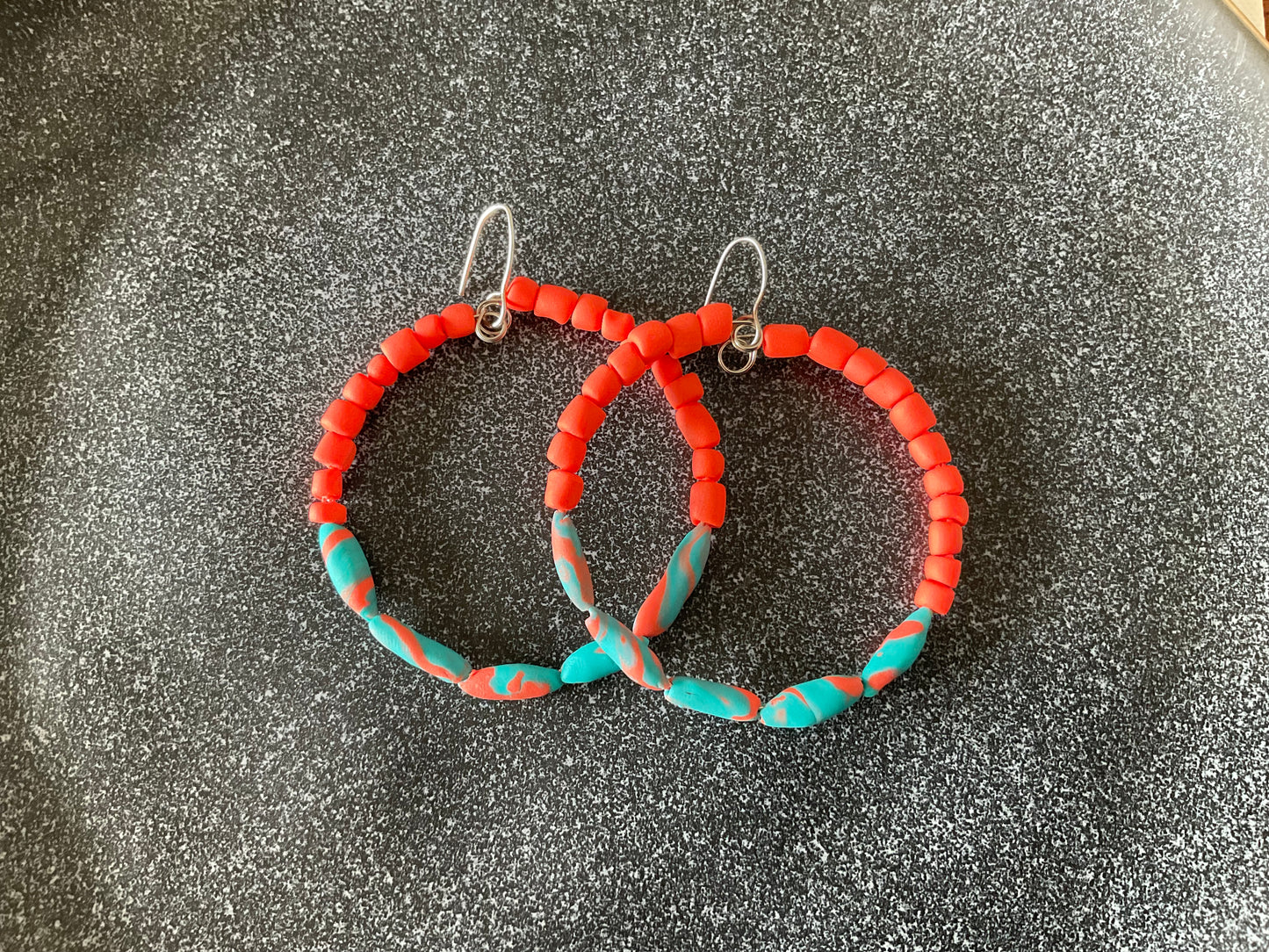 Hand rolled clay earrings - torquoise + coral