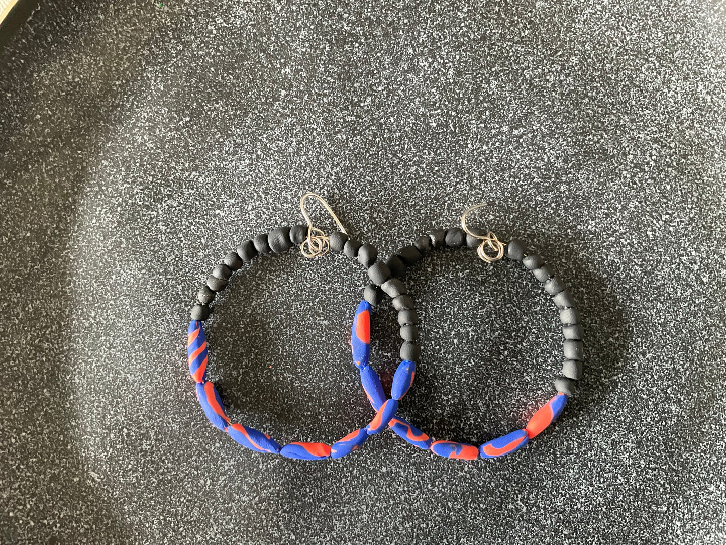 Hand rolled clay earrings - blue/red + black