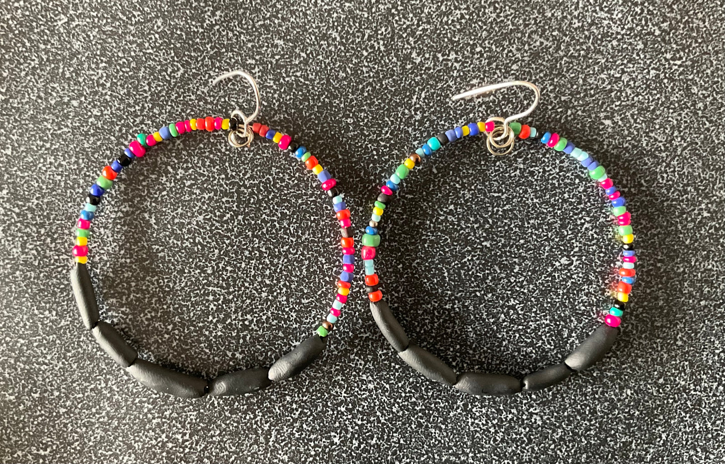 Hand rolled clay earrings - Rainbow + pod black