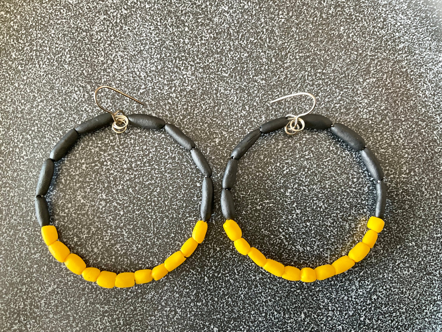 Hand rolled clay earrings - Black + sunflower