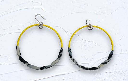 Hand rolled clay earrings - yellow glass + marble twirl